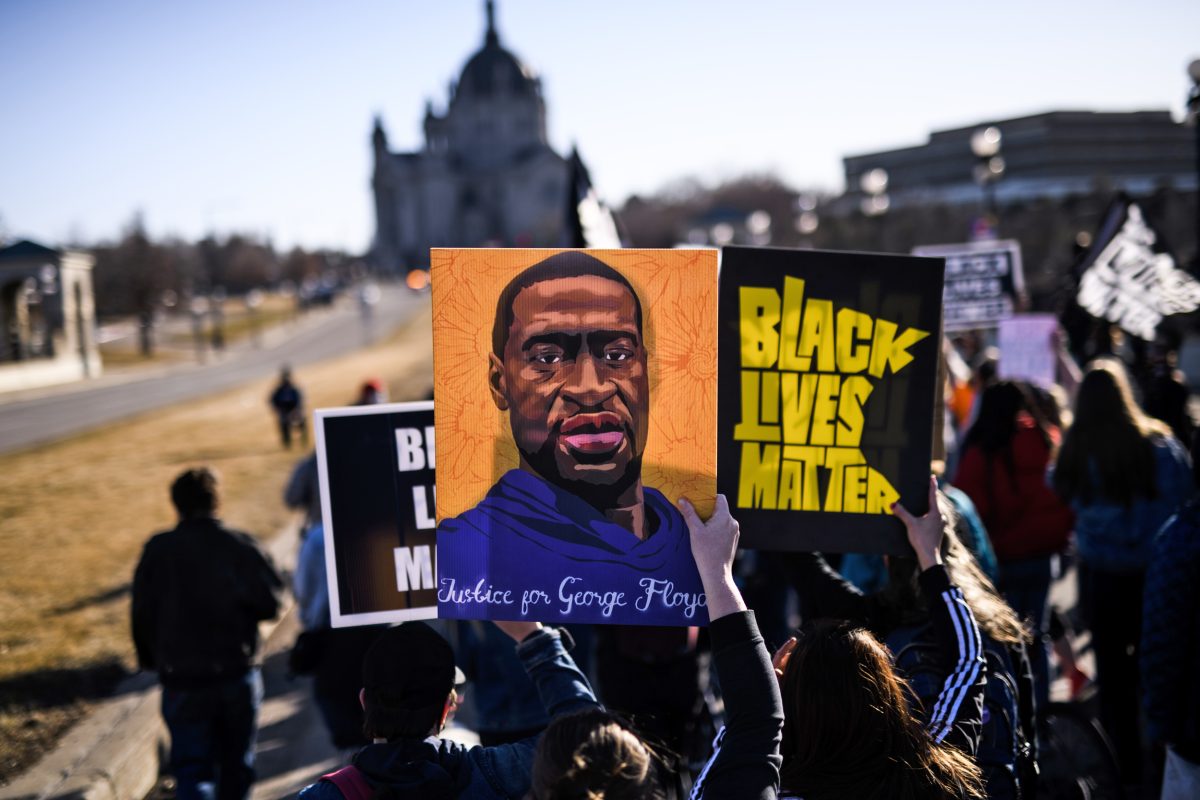 ST PAUL, MN - MARCH 19: People march near the Minnesota State Capitol to honor George Floyd on March 19, 2021 in St Paul, Minnesota. This morning Judge Peter Cahill rejected motions for change of venue and continuance by the defense of former Minneapolis Police officer Derek Chauvin, who is accused of killing George Floyd last May. (Photo by Stephen Maturen/Getty Images)