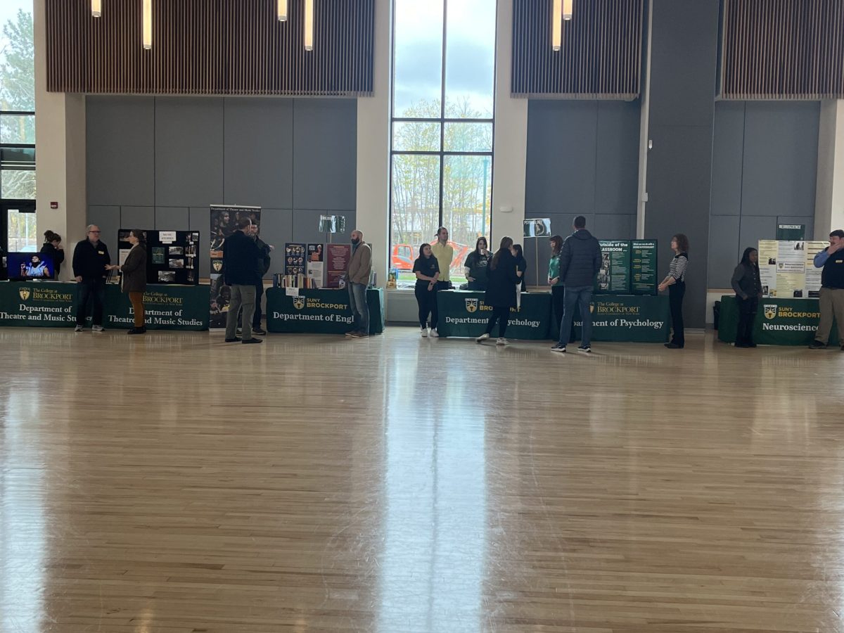SUNY Brockports Open House with information tables set up for students to speak to faculty. Photo Credit: Jason Manuse