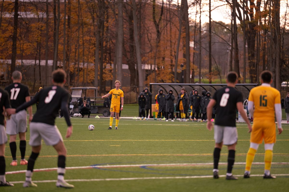 Dylan Rippe standing over a free kick in Wednesdays loss to Oneonta. (Photo Credit: Brockport Athletics)