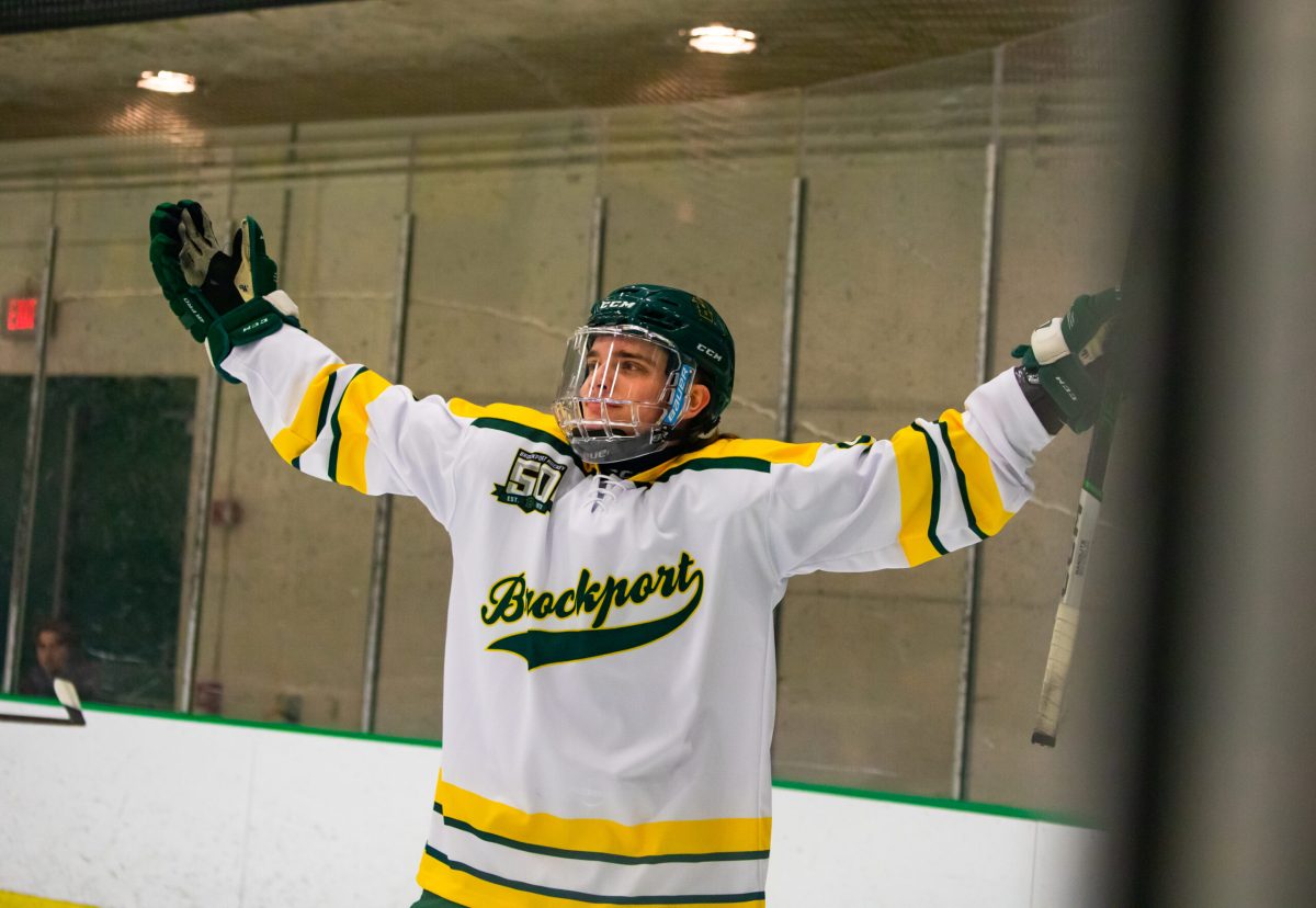 Chase+Maxwell+celebrating+a+his+powerplay+goal.+%28Photo+Credit%3A+Liv+Metz%2FBrockport+Athletics%29