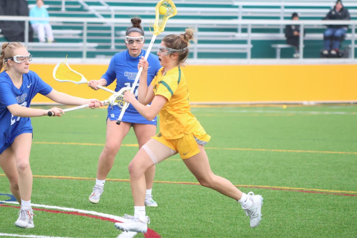 Brockport's Cassidy Burnash drives towards goal in Wednesday's win over Fredonia. Burnash tallied nine points (four goals and five assists) for the Golden Eagles.