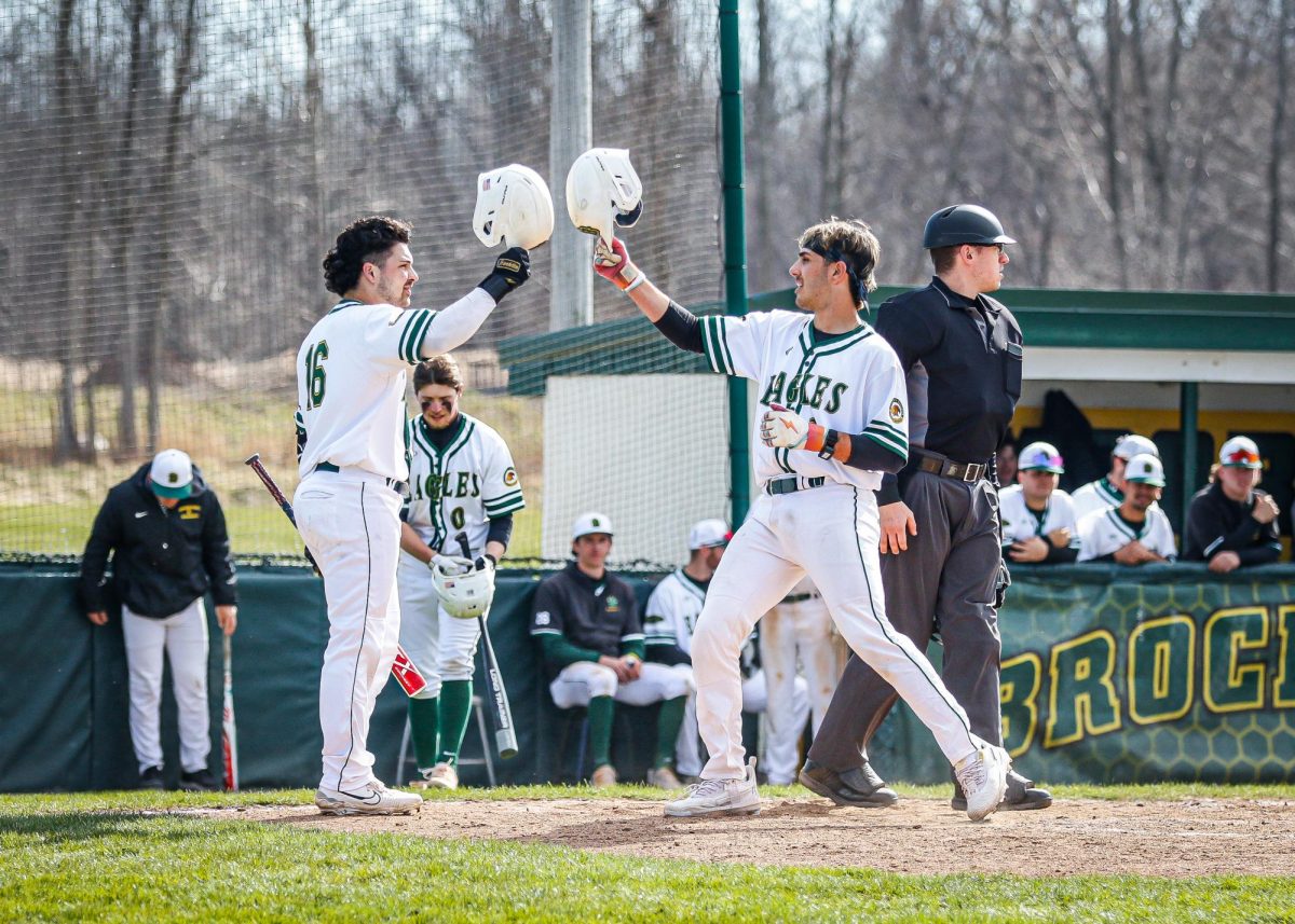 Brockports+Matt+Meyer+rounding+the+bases+after+his+third-inning+home+run+in+Mondays+second+game+against+Fredonia.+Meyer+finished+3-for-5+at+the+plate+with+five+RBI+in+Brockports+11-2+win.