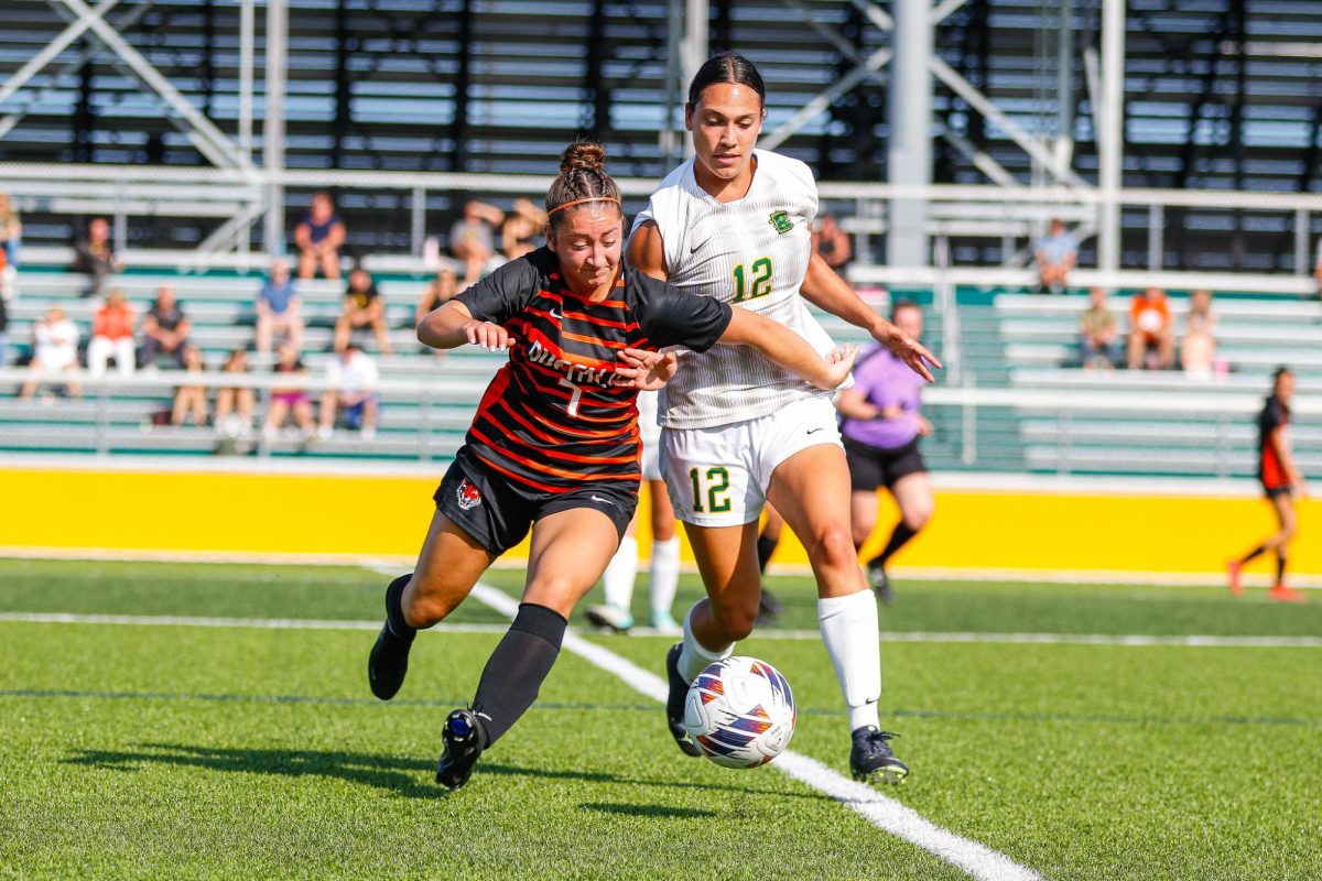 Megan Gerber battles with a Buffalo State defender