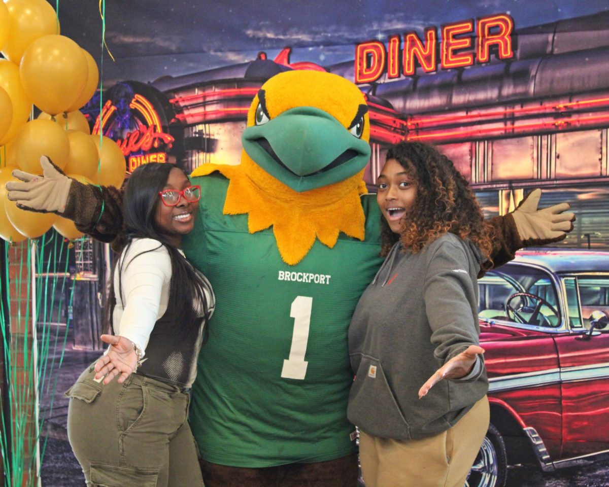 Amaya Miller (left) and Terrisha Gordon with Ellsworth at his birthday celebration (Photo Credit: Lainey Porter)