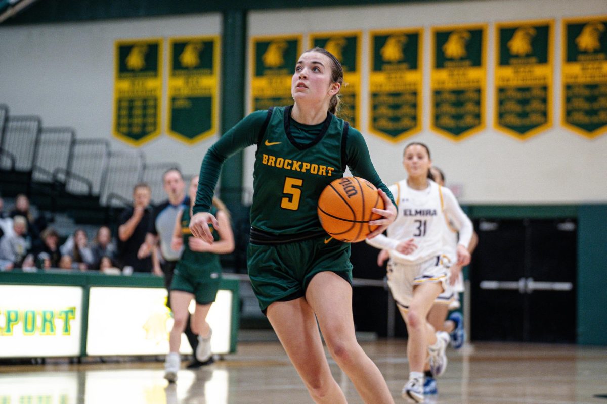 Maneri with the ball in Brockport's matchup versus Elmira College