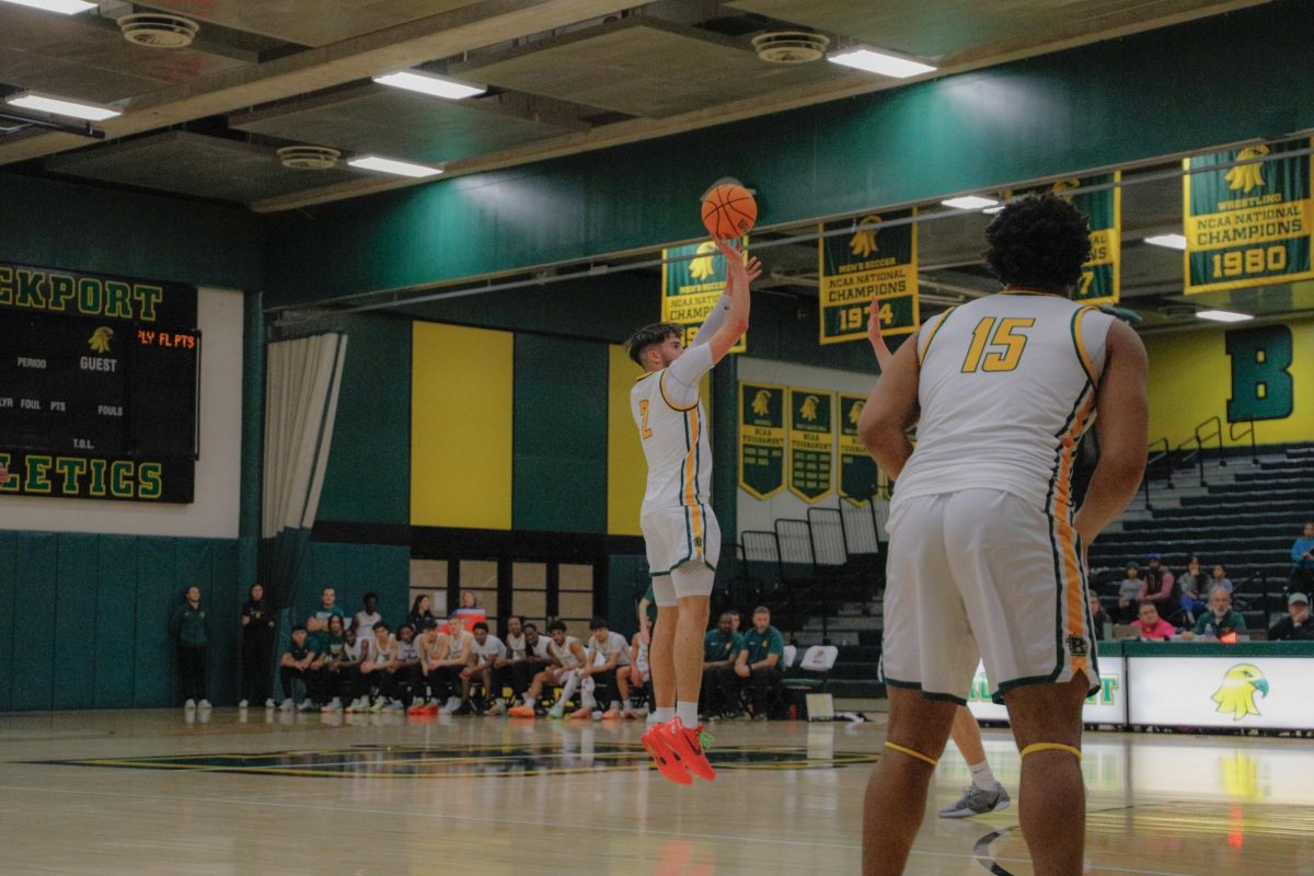 Zach Rice with the ball for Brockport. Rice led the Golden Eagles in scoring with 16 points.