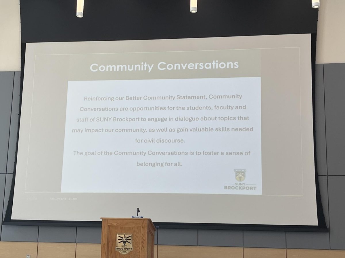 The goal of Community Conversations can be seen on the screen prior to the start of the event.