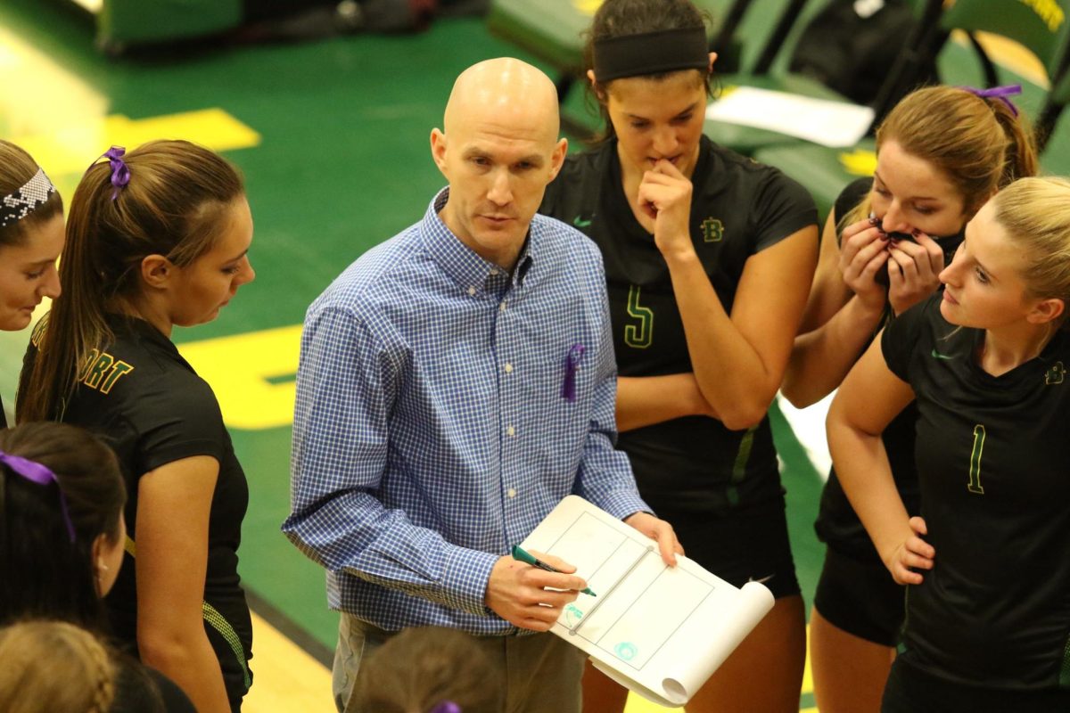 Pike coaching Brockport volleyball in 2015.