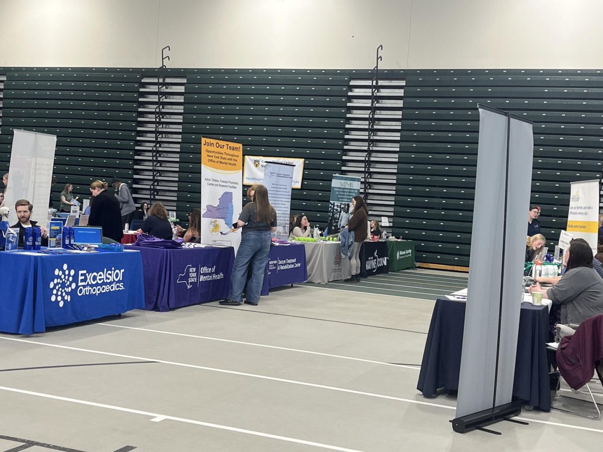 Students talk to employers at the annual Job Fair.