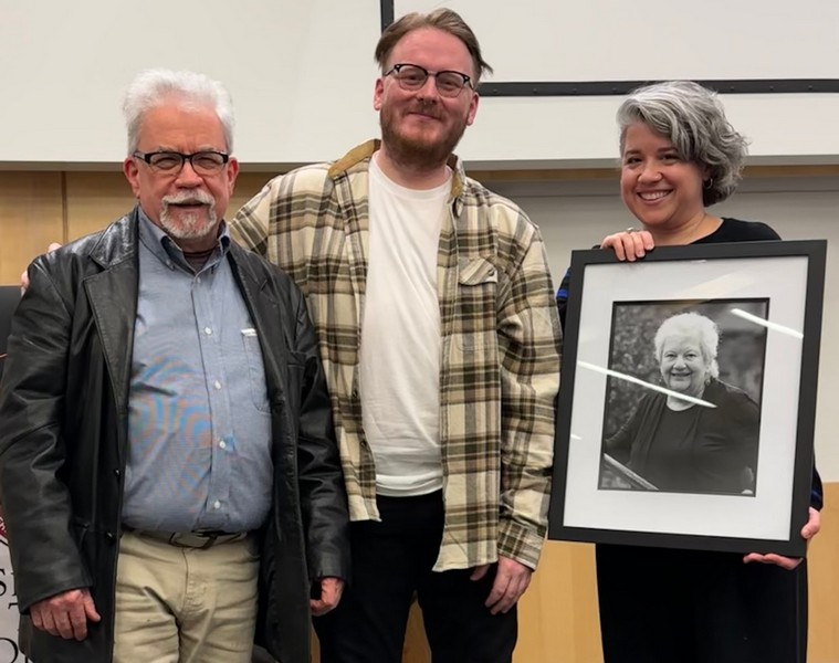(From left to right) Peter Tonery, Brennan Sprague, and Meghan Tonery (holding a picture of M.J. Iuppa) at the ceremony to award Sprague the scholarship prize.(Photo Credit: Peter Tonery)