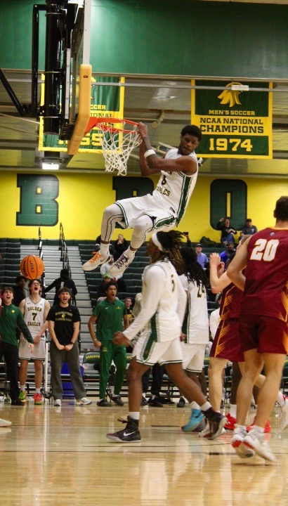 Cameron Dyer slams down two of his 13 points in Brockport's semifinal victory over St. John Fisher.
